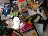 a pile of books that are on the floor