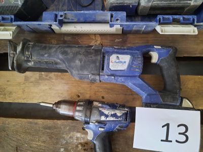 two electric tools that are sitting on a wooden table