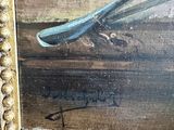 a picture of a painting of a spoon and a spoon rest on a table