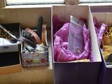 two boxes with different items in them on a table