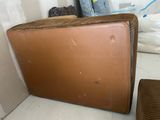 a piece of luggage sitting on the floor in a room