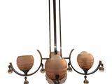 an image of a chandelier with three lamps hanging from the ceiling