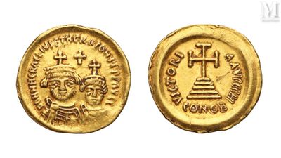 a gold coin with a cross and a cross on it