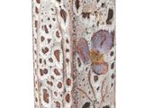 a vase with a flower design on it on a white background