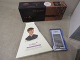 a box with a picture of a young man on it and a box with a picture of a young man on it