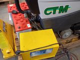 a yellow box with a red battery and a yellow box with a yellow battery