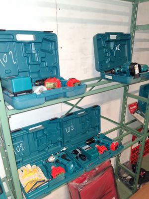 many tools on the shelves in the garage