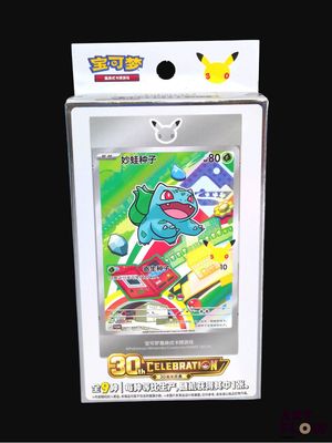 a close up of a pokemon trading card in a box