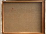 a close up of a picture of a picture frame on a wall