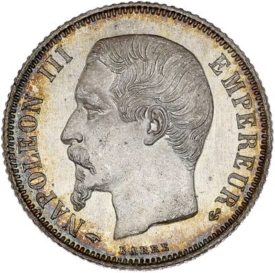 a close up of a coin with a man ' s face on it