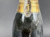 a bottle of champagne that is sitting on a table