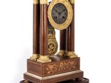 a clock that is sitting on top of a table