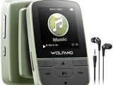 a mp3 player with ear buds and headphones in front of it