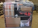 a large metal cage with a bunch of boxes in it