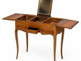 an image of a wooden desk with a laptop on top of it