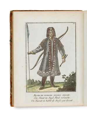 un vieux livre sur lequel figure le dessin d'un homme tenant une épée