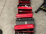 a lot of tools that are sitting on the floor