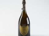 a close up of a bottle of champagne on a white background