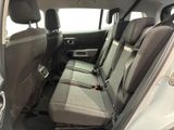 the back seats of a car with a seat belt in the back