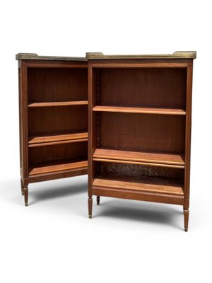pair of mid - century walnut bookcases with open shelves