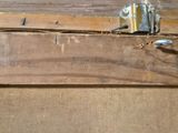 a piece of wood that has been cut off and is sitting on the floor