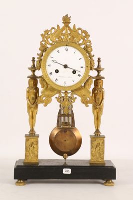 a clock that is sitting on top of a table