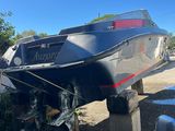 a boat that is sitting on the ground in the yard