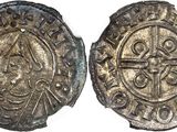 une pièce d'argent avec une croix au recto et une croix au verso