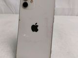 an apple iphone is sitting on a table with a white background