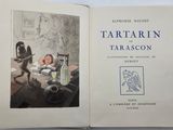 an open book with a picture of a man laying in bed