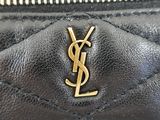 a close up of the ysl logo on a black purse