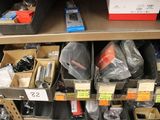 many boxes of assorted items on a shelf