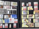 a black case with stamps and post it notes on it