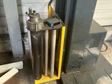 an image of a machine that is sitting in a garage