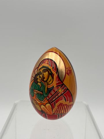 RUSSIE - ŒUF en bois laqué figurant une Vierge, hauteur : 9cm.