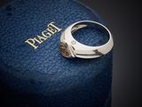the ring is sitting on top of a blue case