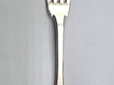 a fork and a spoon on a table
