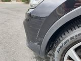 a close up of a tire on the side of a car