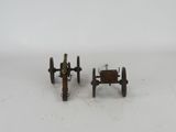 pair of antique cast iron and wood toy cars