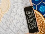 a close up of a piece of fabric with a label on it