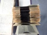 books are stacked on top of each other on a table