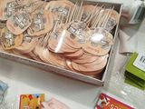 a box full of craft supplies on a table