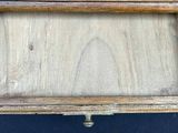 a picture of a wooden box with a clock on it