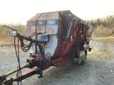 une image représentant un tracteur attelé à une remorque
