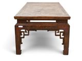 an image of a wooden table with two benches underneath it