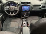 the interior of a small car with a steering wheel and dashboard