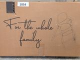 a cardboard box with a drawing of a baby in a highchair