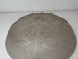 a cake pan sitting on top of a stove