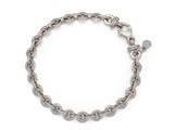 a close up of a chain bracelet with a heart charm