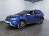 the blue car is parked in a large room with white walls